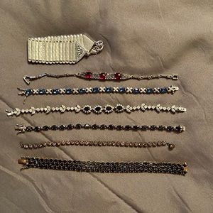 Lot of bracelets. Some are Sterling Silver. Most are stamped.
